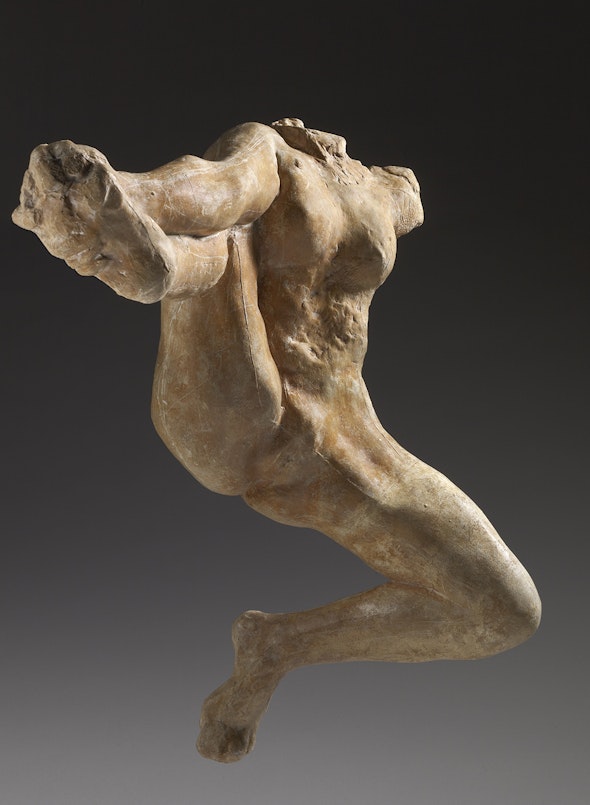 Made of plaster, this headless sculpture of Iris, messenger of the gods, extends its legs in midflight.