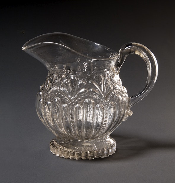 <p>This glass pitcher can be found in Braun's cupboard. </p>