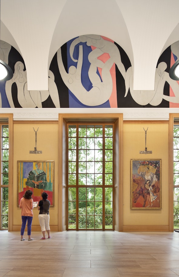 A window streams light into a gallery at the Barnes Foundation.